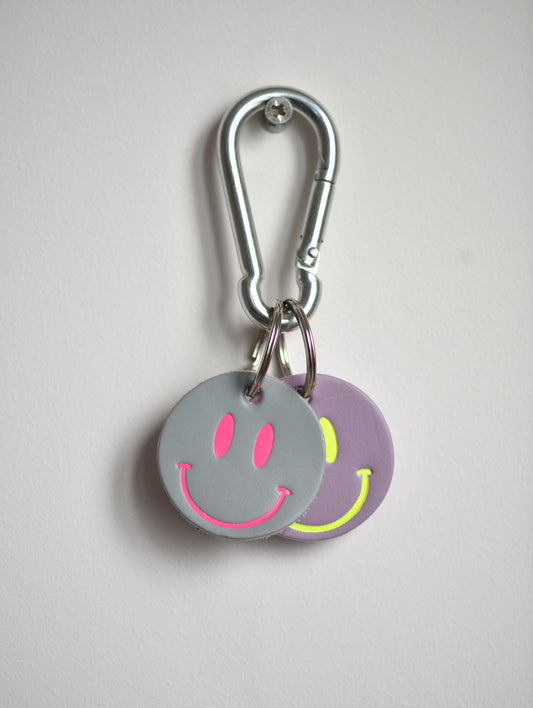 PAIR OF SMILEY KEYRINGS
