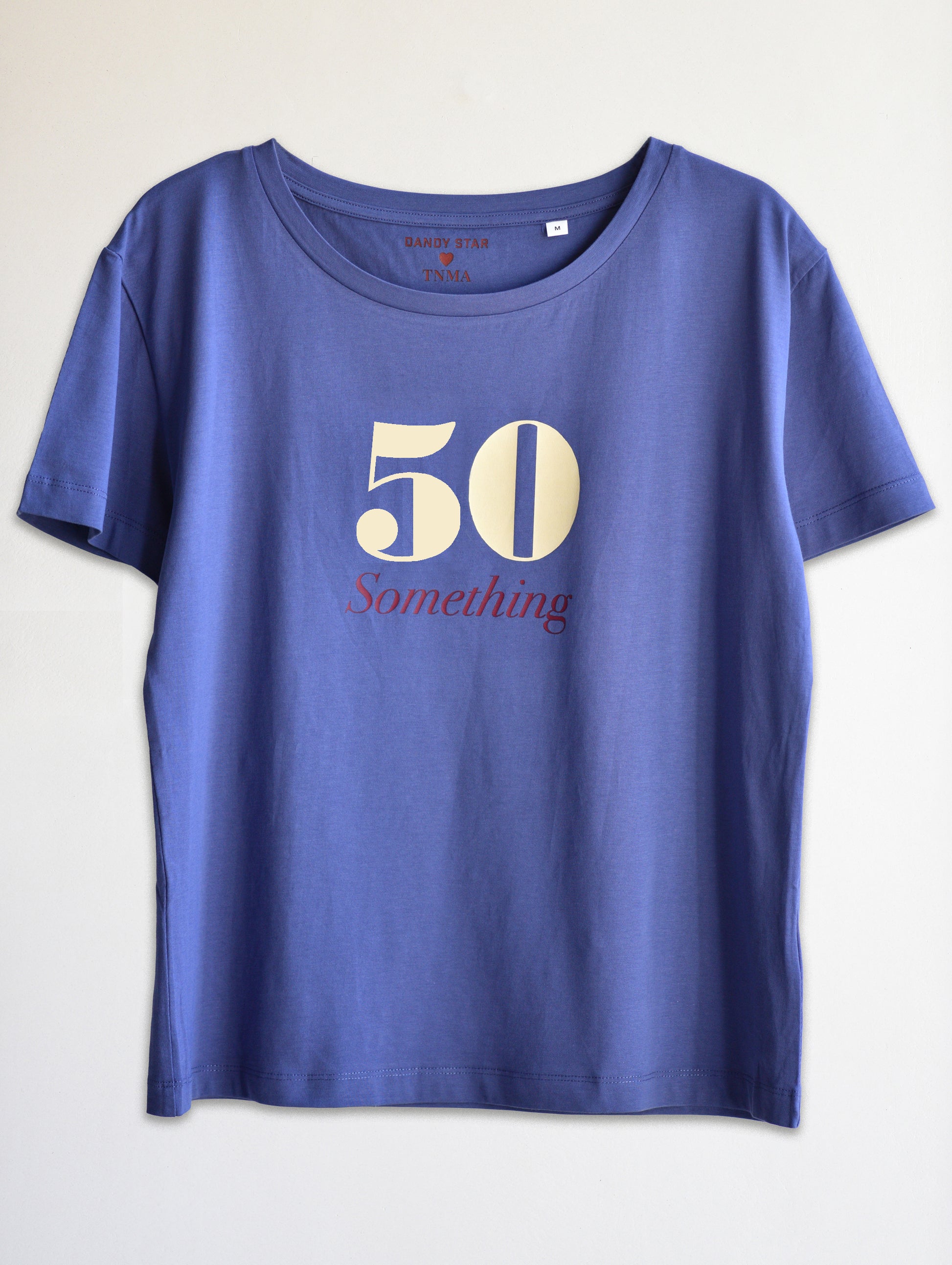 Blue t-shirt with '50 Something' text on a white background