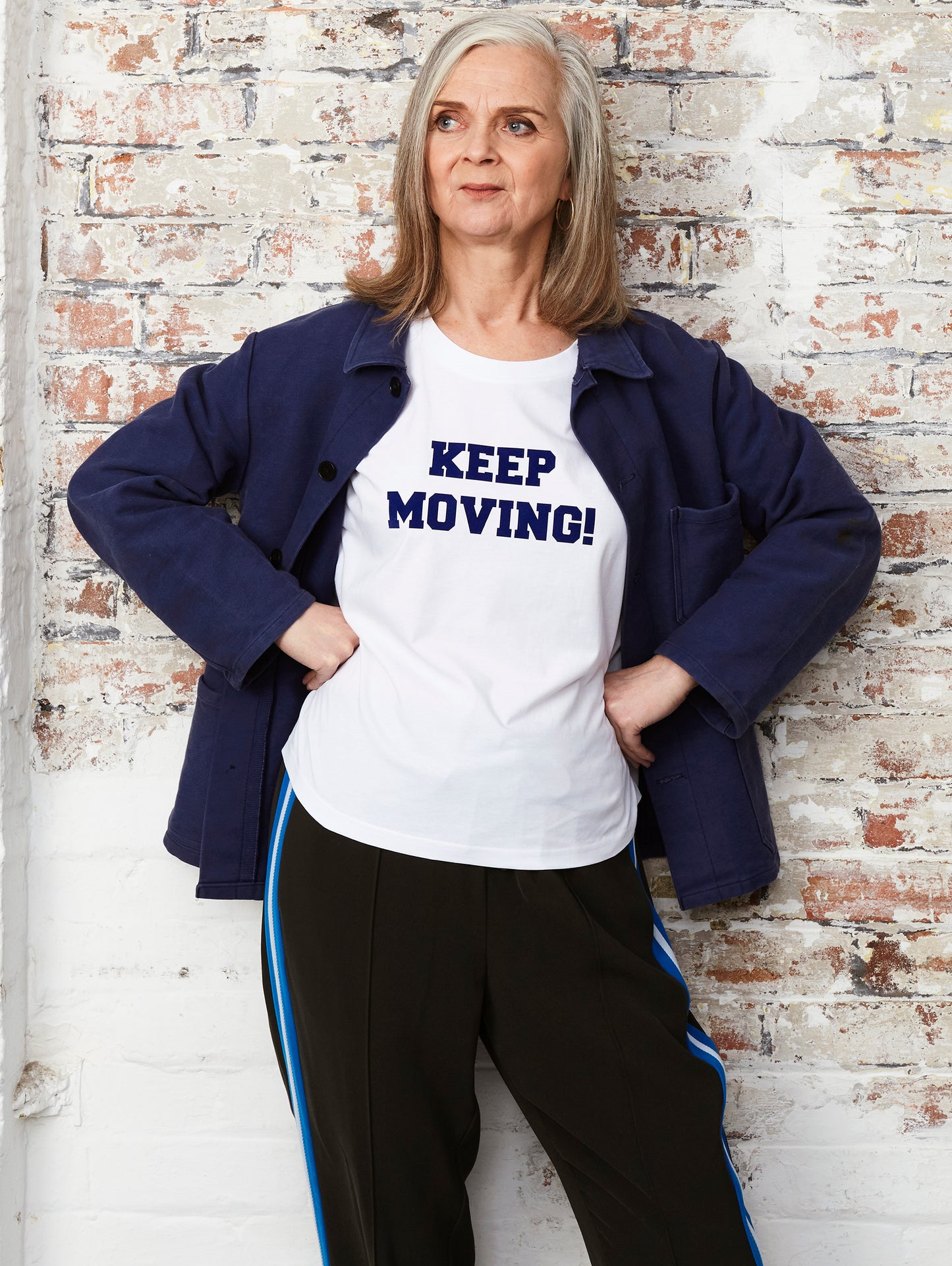 Keep moving in navy flock on a white organic cotton relaxed fit t-shirt