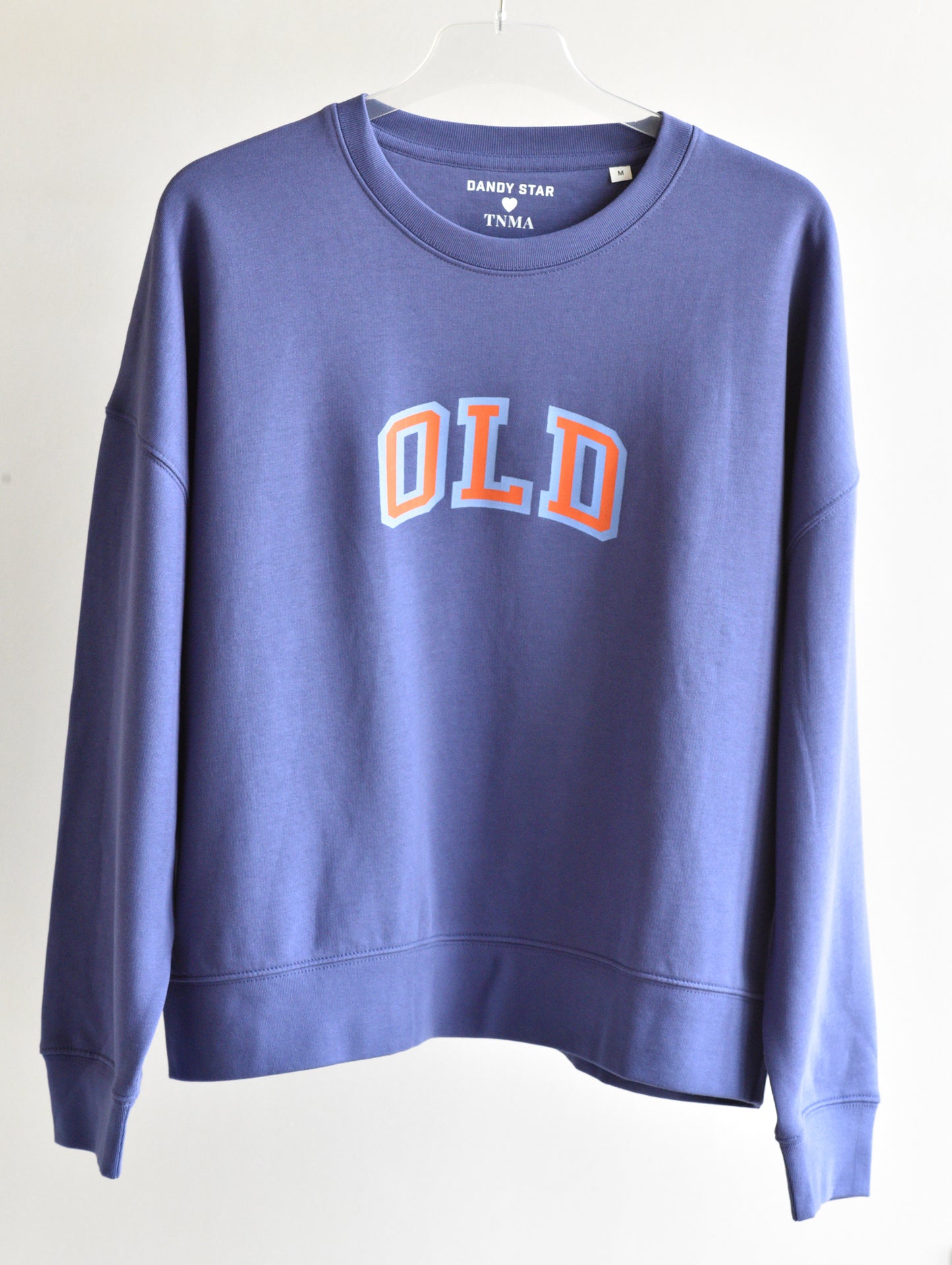 Blue sweatshirt with 'OLD' text on a white background