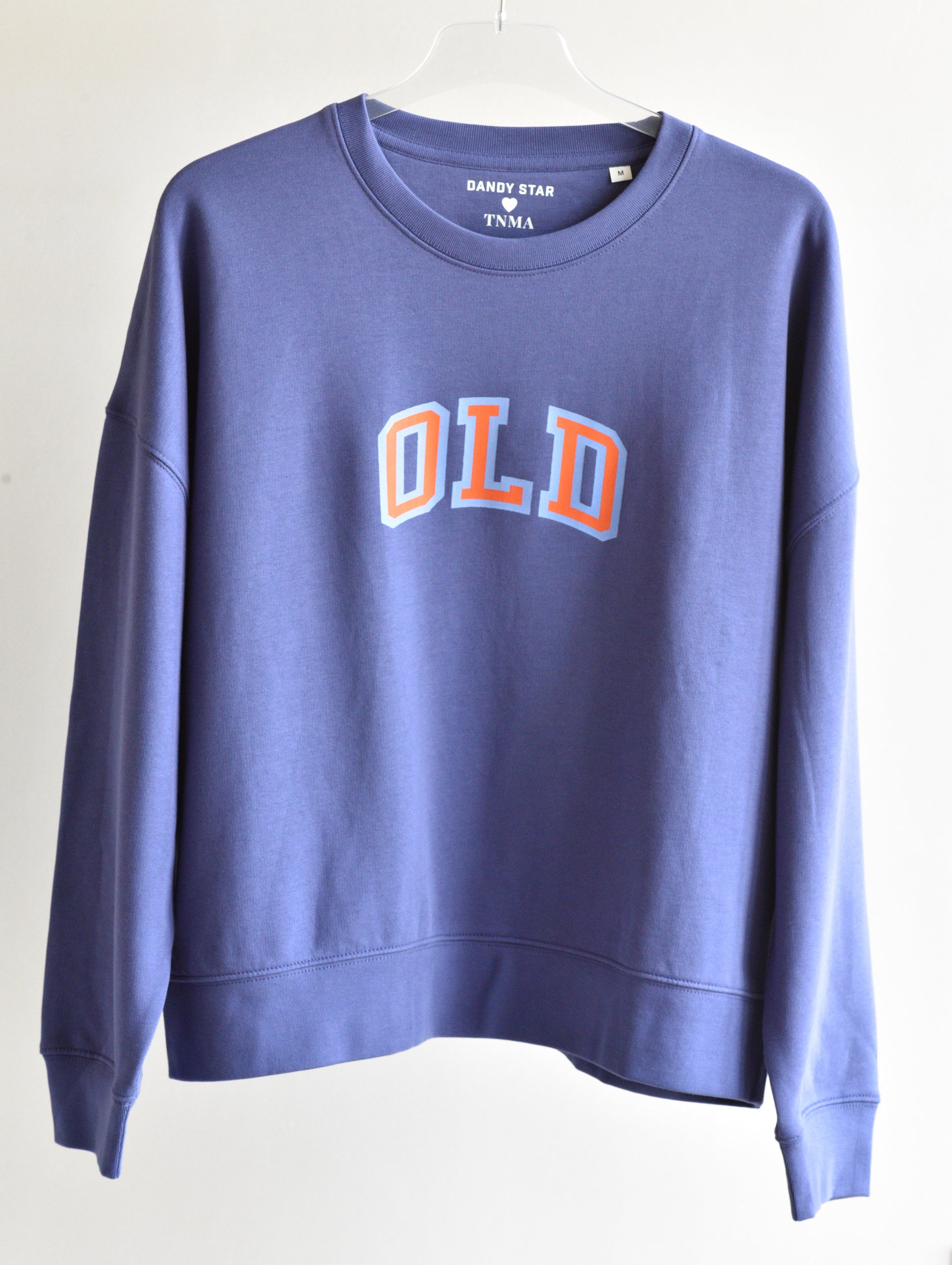 Blue sweatshirt with 'OLD' text on a white background