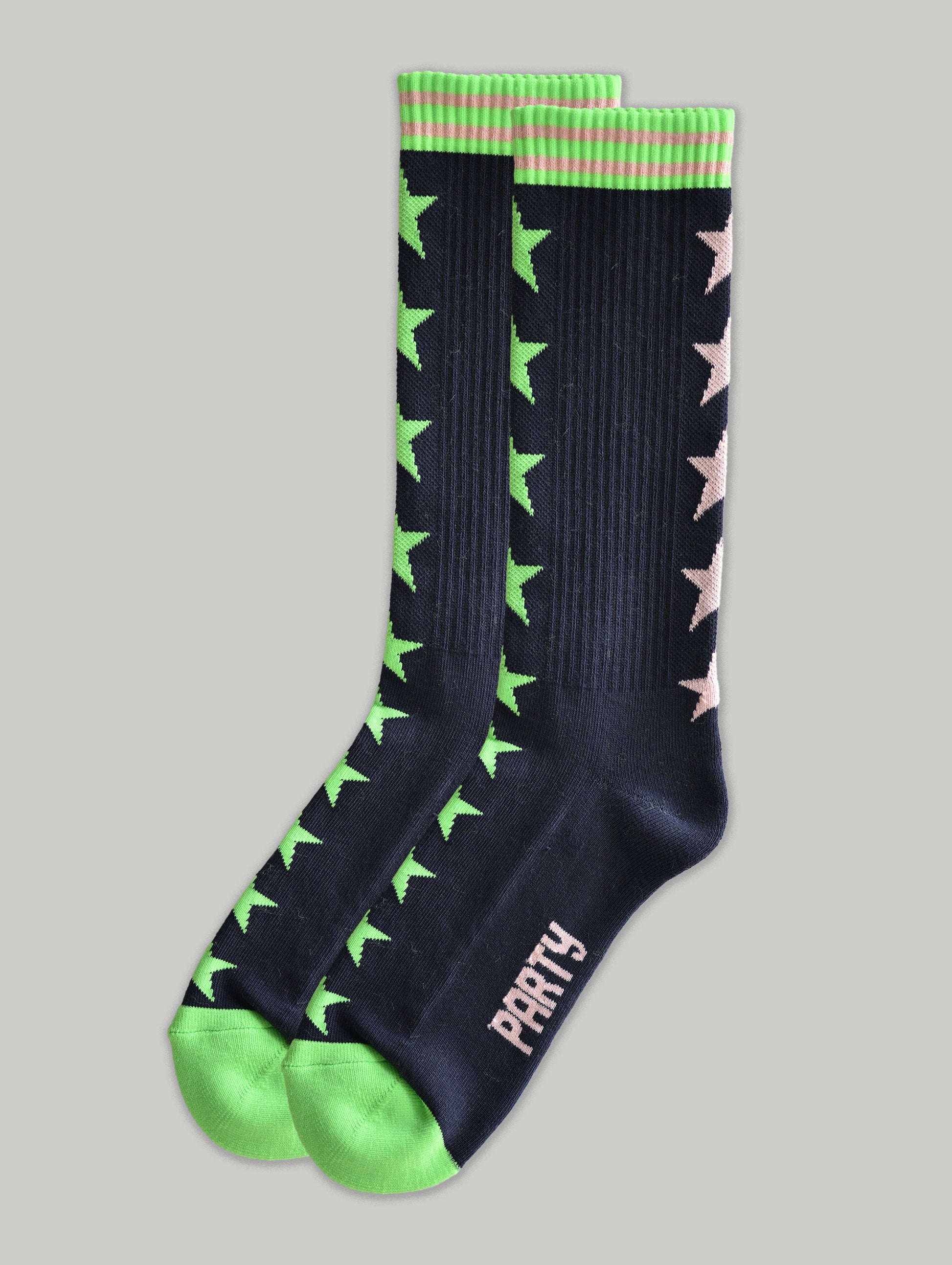 Black socks with green and pink star patterns on a gray background