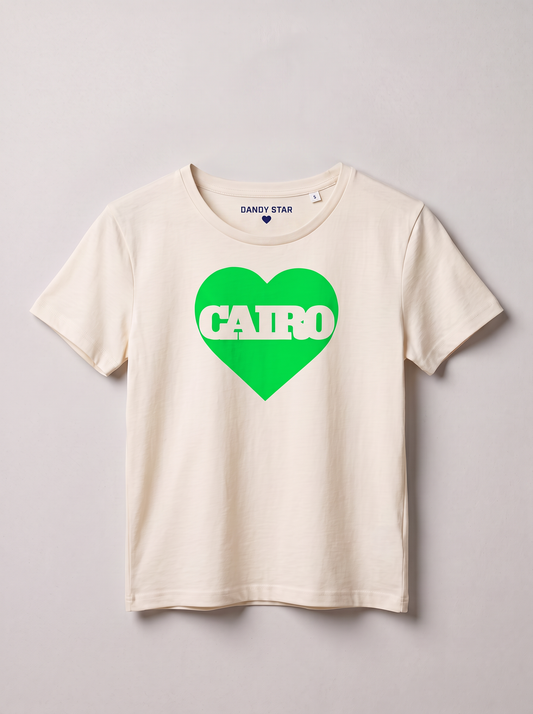 An off-white short-sleeve t-shirt with a green heart graphic on the chest containing the word 'CAIRO' in white. The inner neck label shows the brand 'DANDY STAR'.
