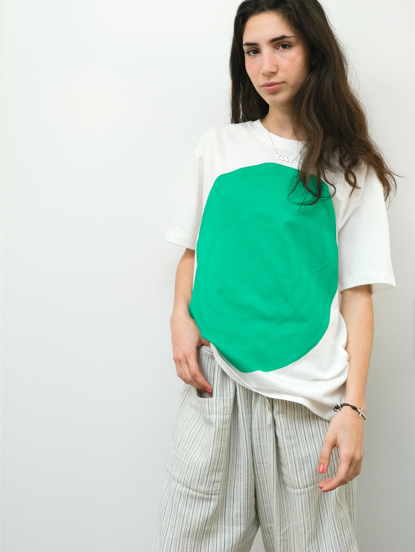 Hand painted green earth t-shirt on off white organic cotton