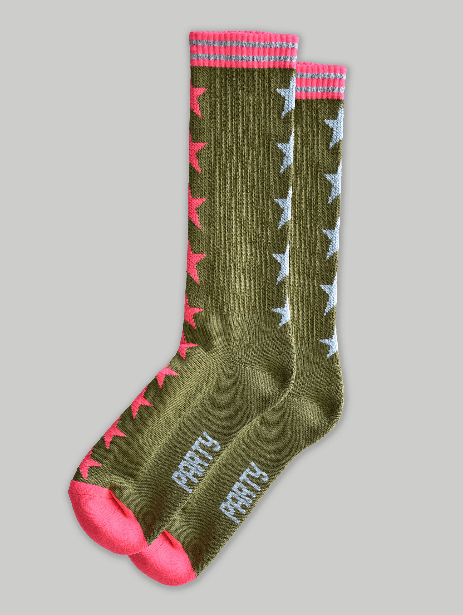 Green socks with pink and white star patterns and 'PARTY' text on a gray background