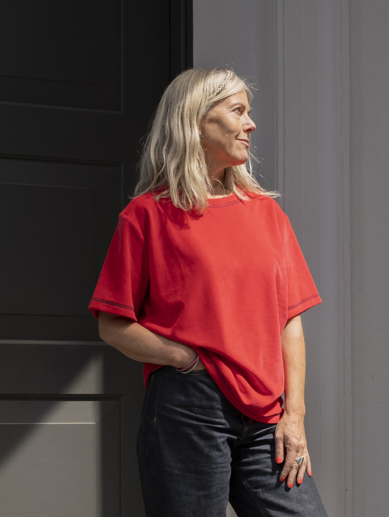 Ella wearing RED VELOUR T-SHIRT with navy contrast overstitch detail